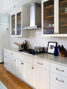 Letting in natural light creates a feeling of space and light in this townhouse kitchen remodel