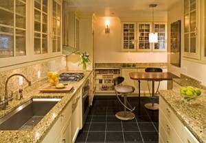 tan kitchen with tan and black countertops