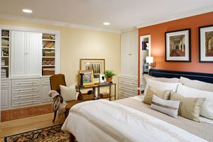 Custom built-In cabinets add storage and visual interest to a master suite renovation