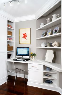home office with custom built-in shelves and desk