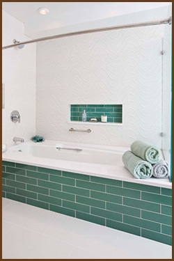 remodeled bathroom with green tile