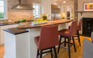 Bespoke elliptical countertop caps the island