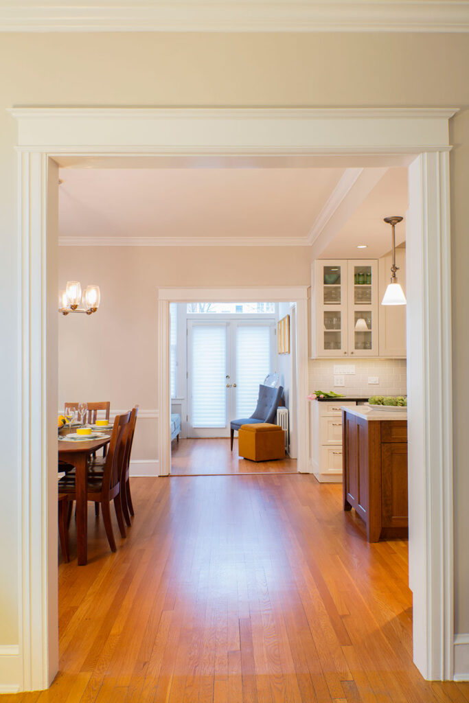 A transitional kitchen with natural flooring 