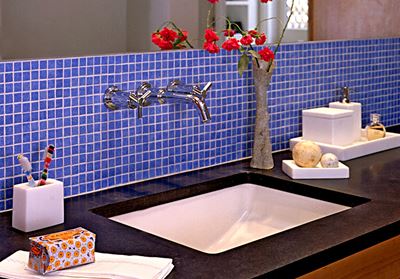 Newly renovated master bathroom with blue backsplash