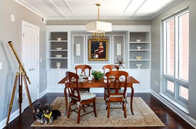 dinning room with custom built-in shelves