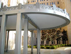 unique circular white and silver awning of a building