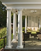 outdoor porch with pillars abd ceiling fan