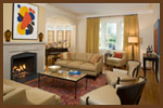 painting and fireplace inform room color scheme