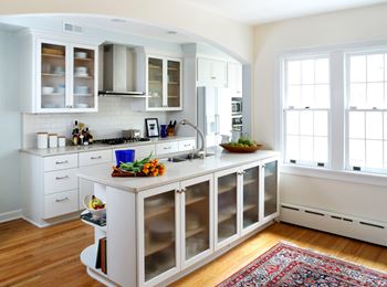 A photo of a new modern kitchen design in a tudor-style home