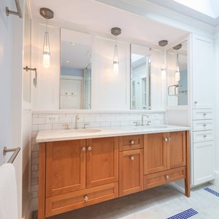 modern bathroom with light natural wood vanity