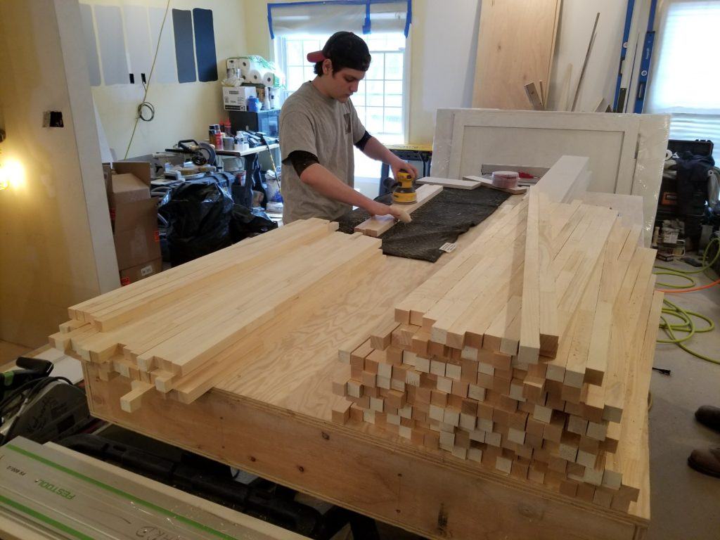Wentworth Studio contractor sanding wood