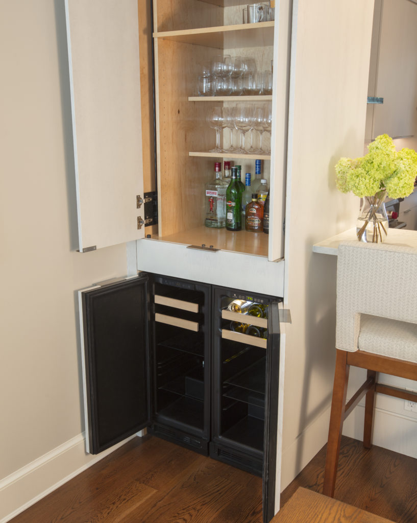 Newly renovated kitchen in DC includes a custom breakfast bar.