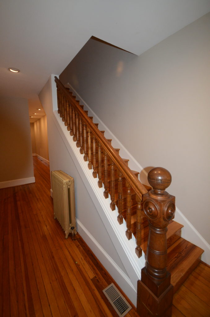 Wooden stair case and wooden floor in house