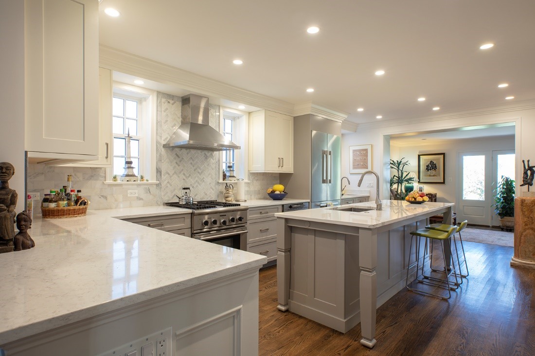 white kitchen with grey lower cabinets and white upper cabinets
