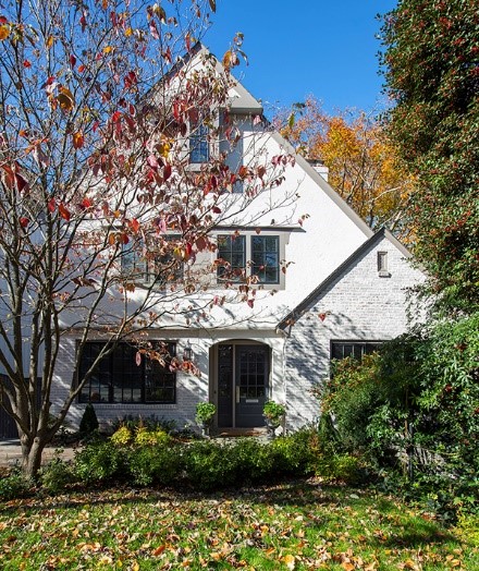 white home exterior with grey and black bricks