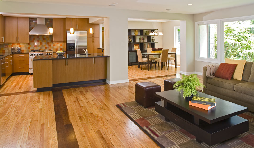 Open concept kitchen with counter separating kitchen from living room