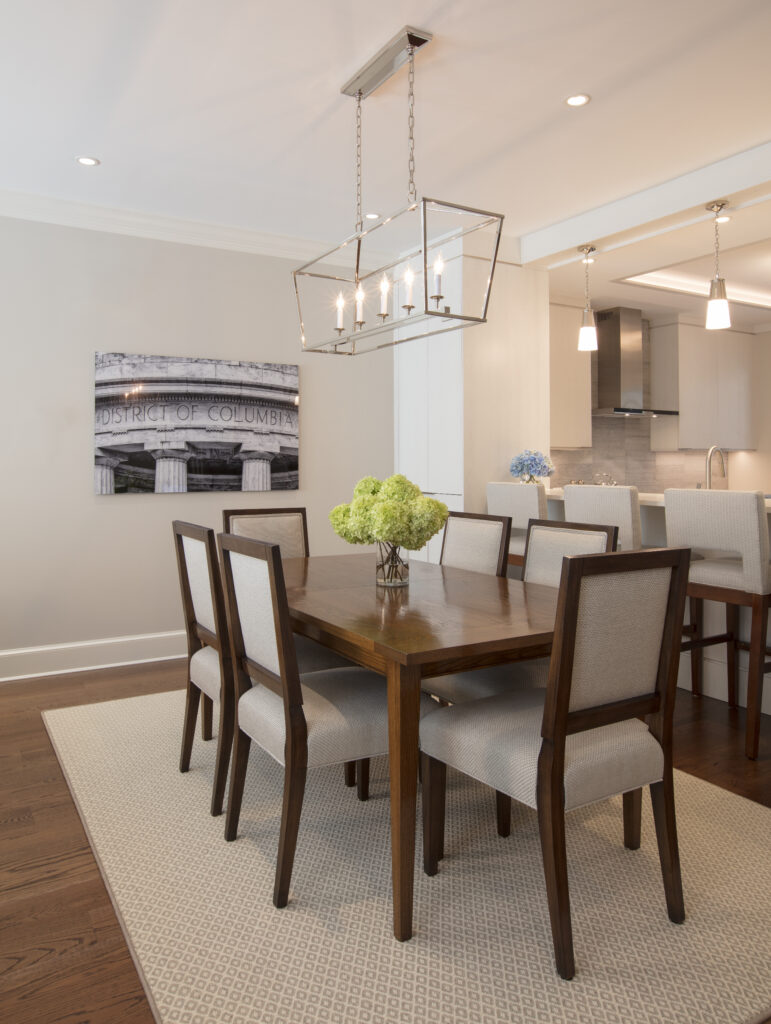 An open-concept kitchen and dining space, created by Wentworth 