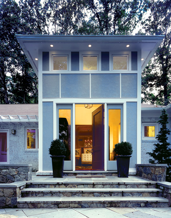 blue home with large front entry door