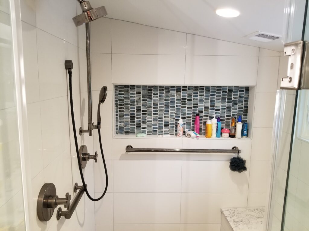 Shower with three grab bars for safe aging-in-place bathroom design