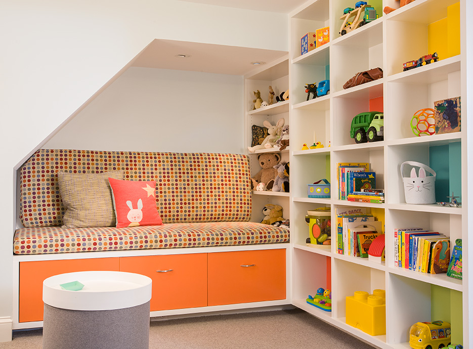 This corner nook from one of our renovations adds storage and a creative area